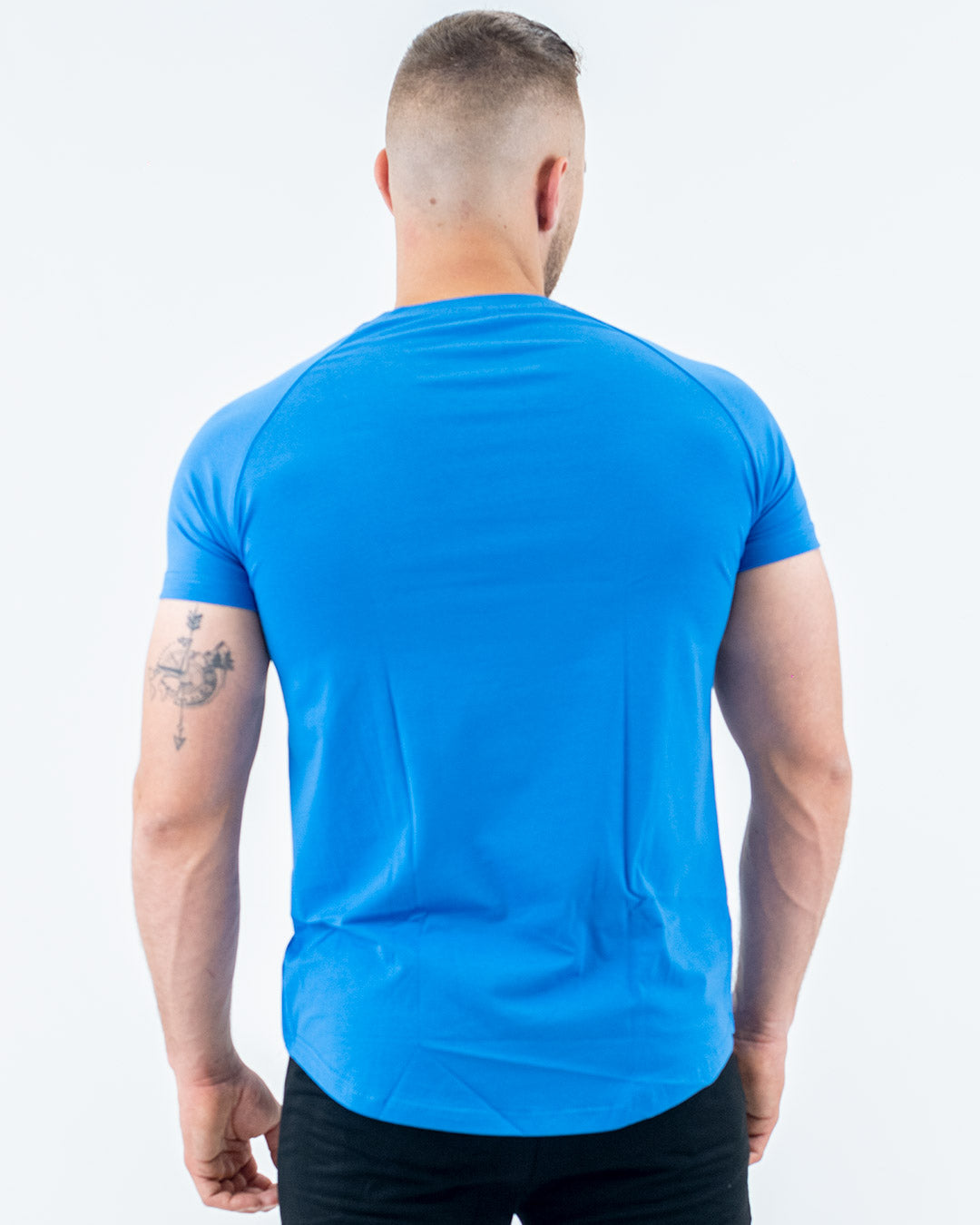Cobalt Blue Fit T-Shirt on model, fitted arms, relaxed midsection