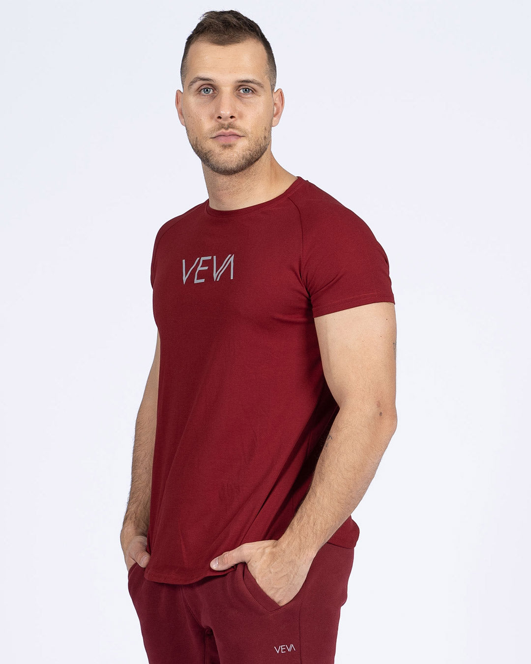 Wine Red Fit T-Shirt on model, fitted arms, relaxed midsection