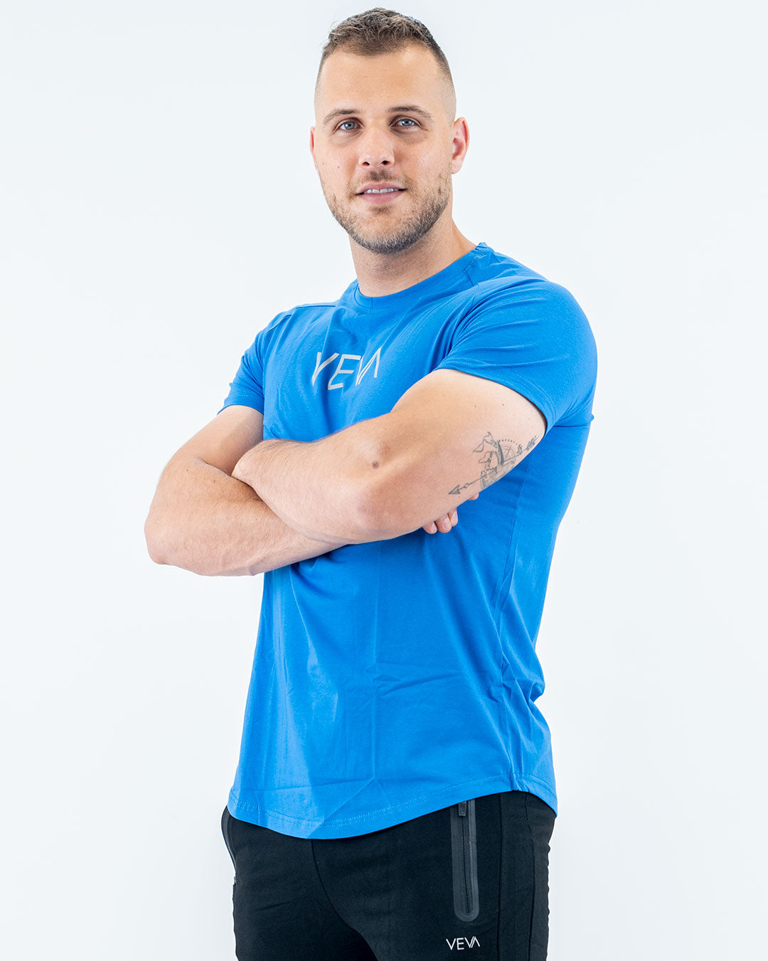 Cobalt Blue Fit T-Shirt side view, curved hem detail