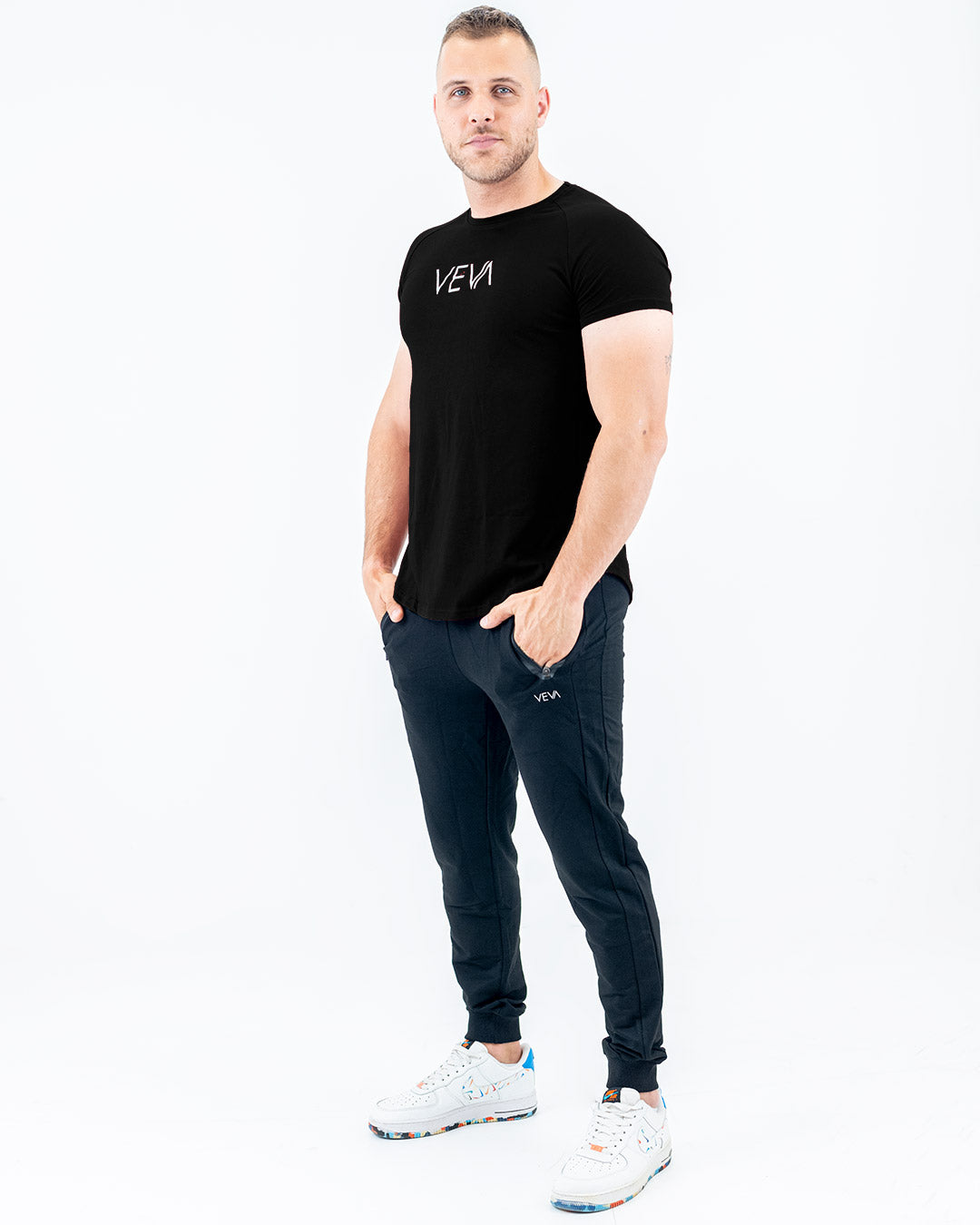 Mighty Black Fit T-Shirt side view, curved hem detail