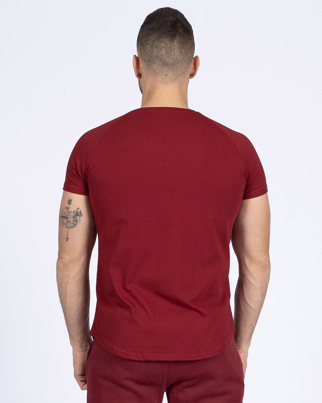 Wine Red Fit T-Shirt side view, curved hem detail